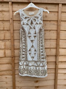 white sequin shift dress