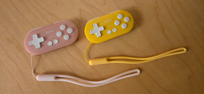 8Bitdo Zero 2 Bluetooth gamepad mini controllers (2) for Switch PC pink & yellow
