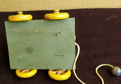 Vintage-Look Whimsical Folk Resin Pig on a Wooden Cart Cast Iron Wheels Pull Toy - Picture 7 of 10