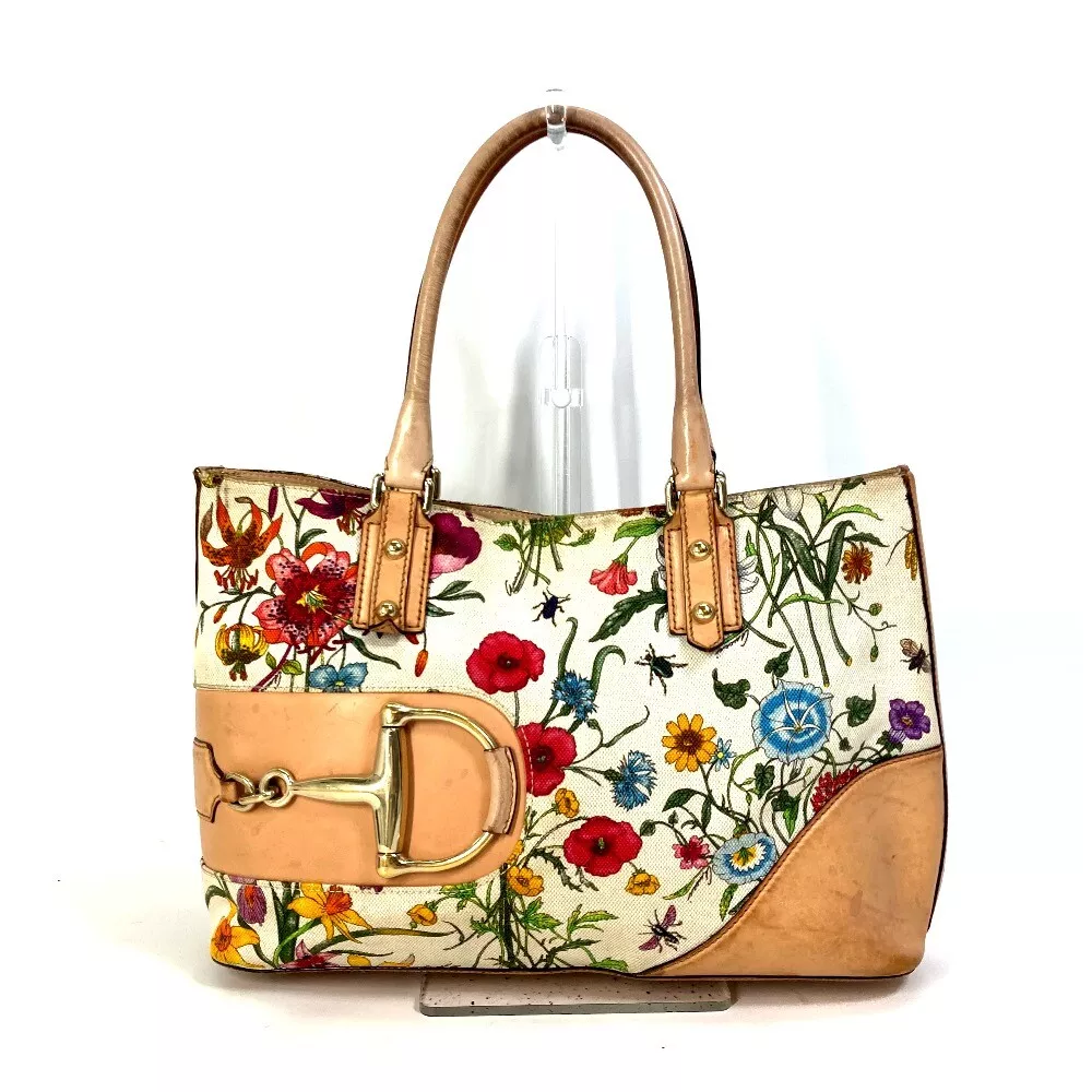 Gucci purse floral best sale pattern