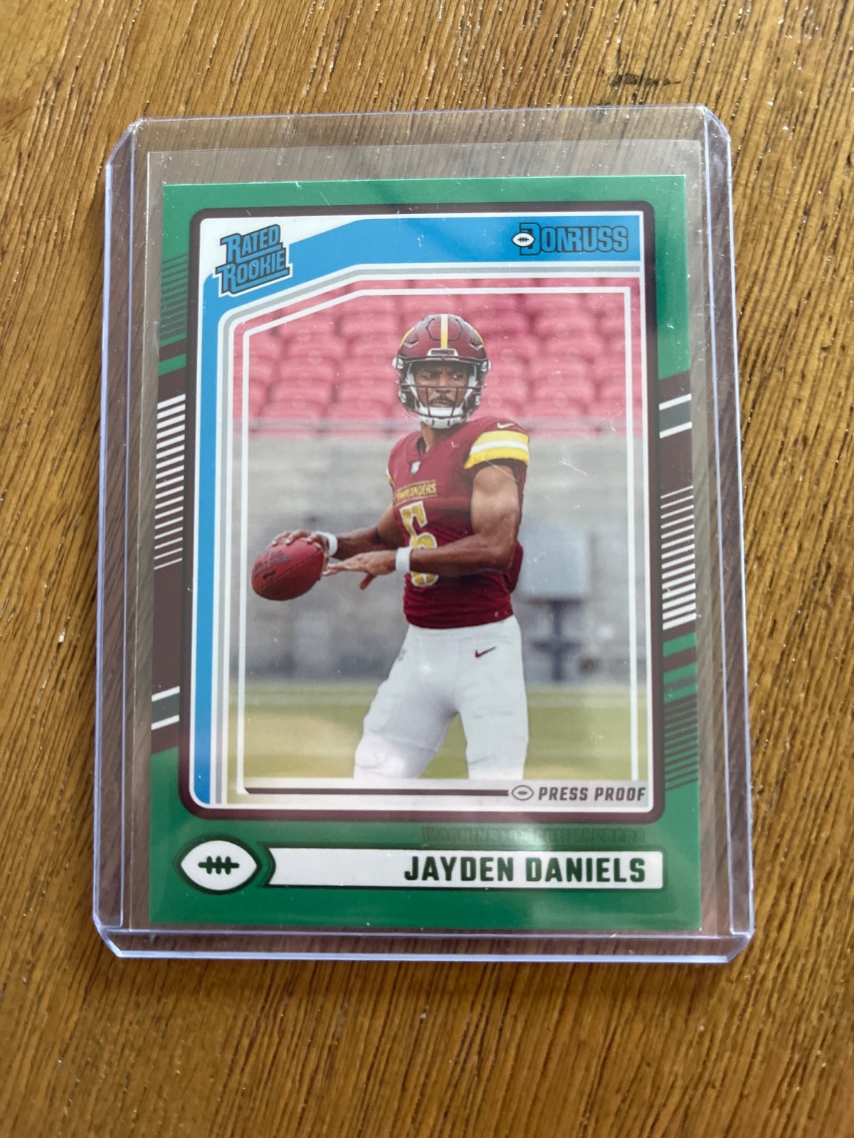 2024 Panini Donruss - Rated Rookie Jayden Daniels #389 Press Proof Green (RC)