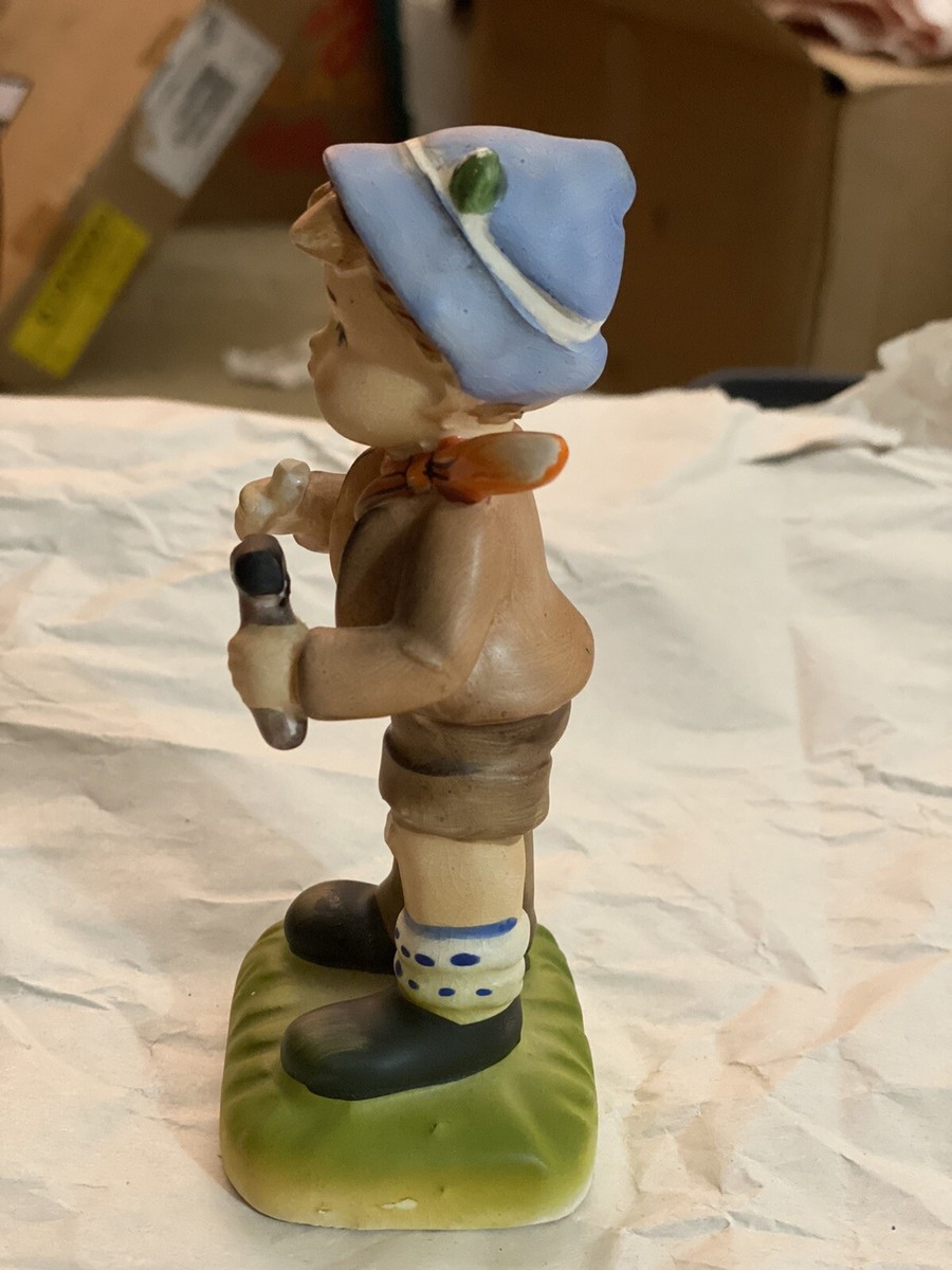 Multicolored 6” Porcelain Figurine Boy with hammer Sore Thumb