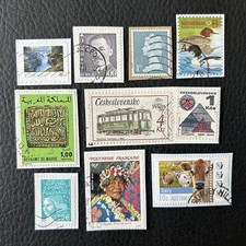 Lot de 10 timbres de Pays divers et années diverses - encore sur frag Stamps D45
