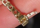 14K stamped tennis bracelet with white stones.  — photo 2