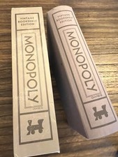 Monopoly Bookshelf Edition - Open Box gray li...