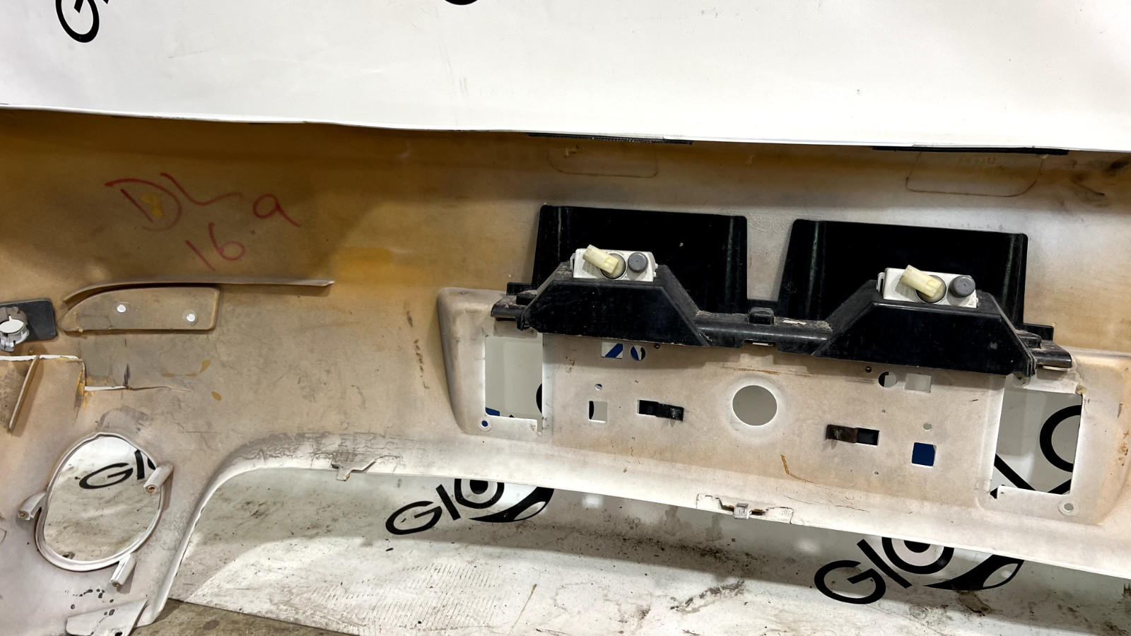 ASTON MARTIN VANTAGE V8 REAR BUMPER 2011 OEM -needs repaired at front edge-