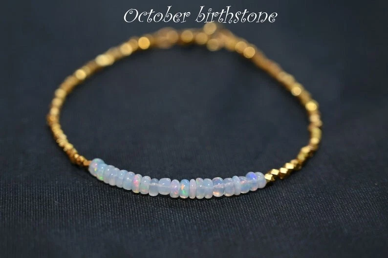 Pulseras A+ de cuentas de piedras preciosas multifacéticas de ópalo etíope y pirita dorada de 6-8"" Foto 2 de 4