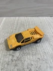 GoBots Pocket Puzzler Yellow Lamborghini Countach Tonka Bandai 1984 Loose Joints