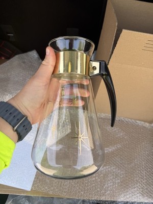 Vintage mid-century modern glass coffee carafe with atomic starburst etching.