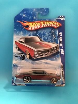 Hot Wheels 2010 Faster Than Ever '67 Pontiac GTO Grey/Red Snow Scene Carded