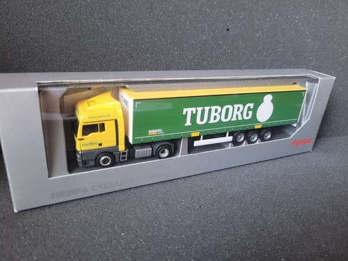 MAN TGX Contino Transport A/S 6330 Padborg Danmark TUBORG Beer Bahntrailer - Bild 6 von 7