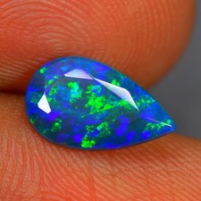 1.07Ct Pear _ 3D Multi Color Playing Natural Welo Black Opal