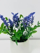 Elegant artificial lavender plant with vibrant purple blooms and lush green leav