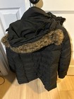 Natural reflection Black Large puffy women coat with faux fur on collar — photo 3