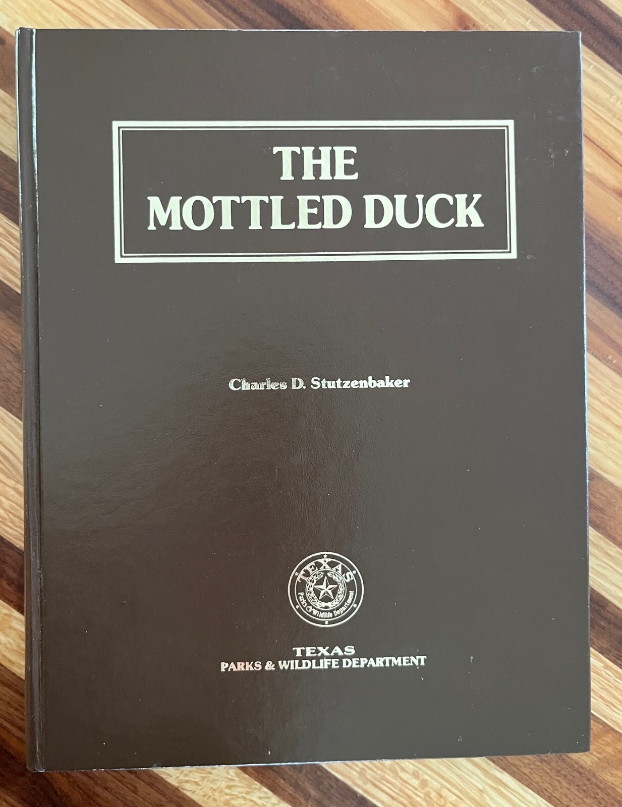 Discover The Mottled Duck by Charles Stutzenbaker in Hardcover Edition