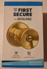 First Secure by Schlage Hawkins Bright Brass Bed & Bath Door Knob 