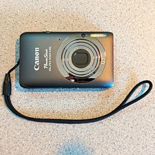 Canon PowerShot ELPH 100 HS 12.1MP Compact Camera 4x Zoom, charger and media