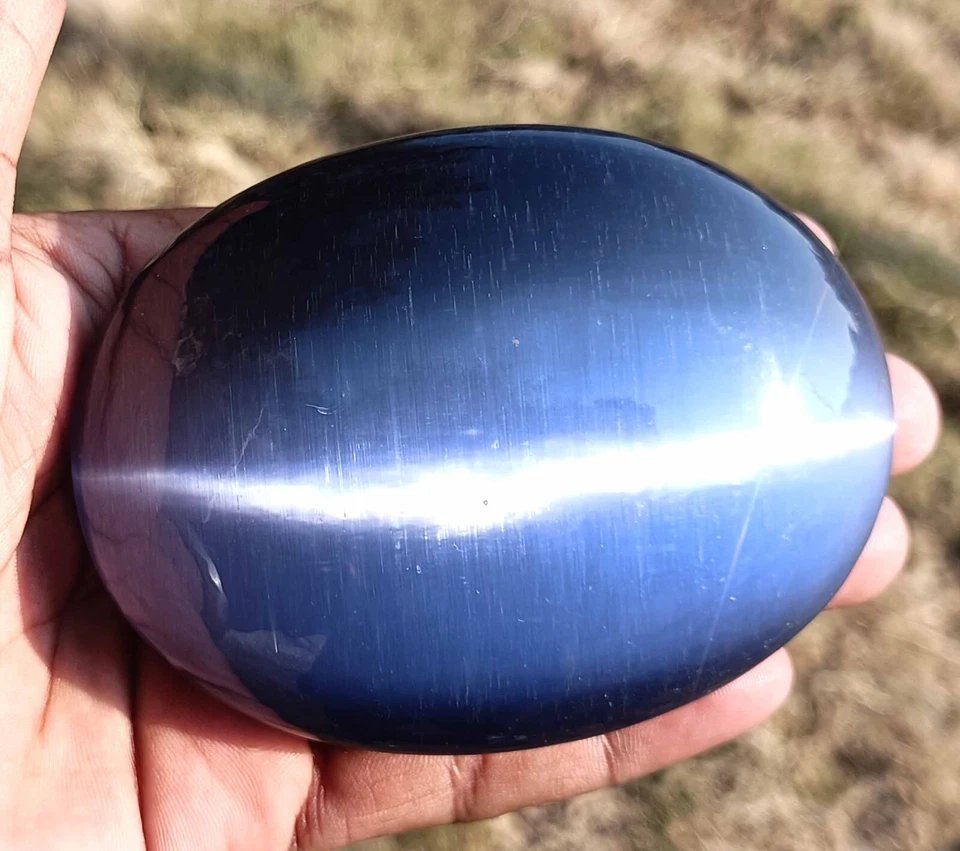 Gemas sueltas corte ovalado sin calefacción ojo de gato púrpura Brasil certificado 1550-1580 quilates DKQ Foto 3 de 4