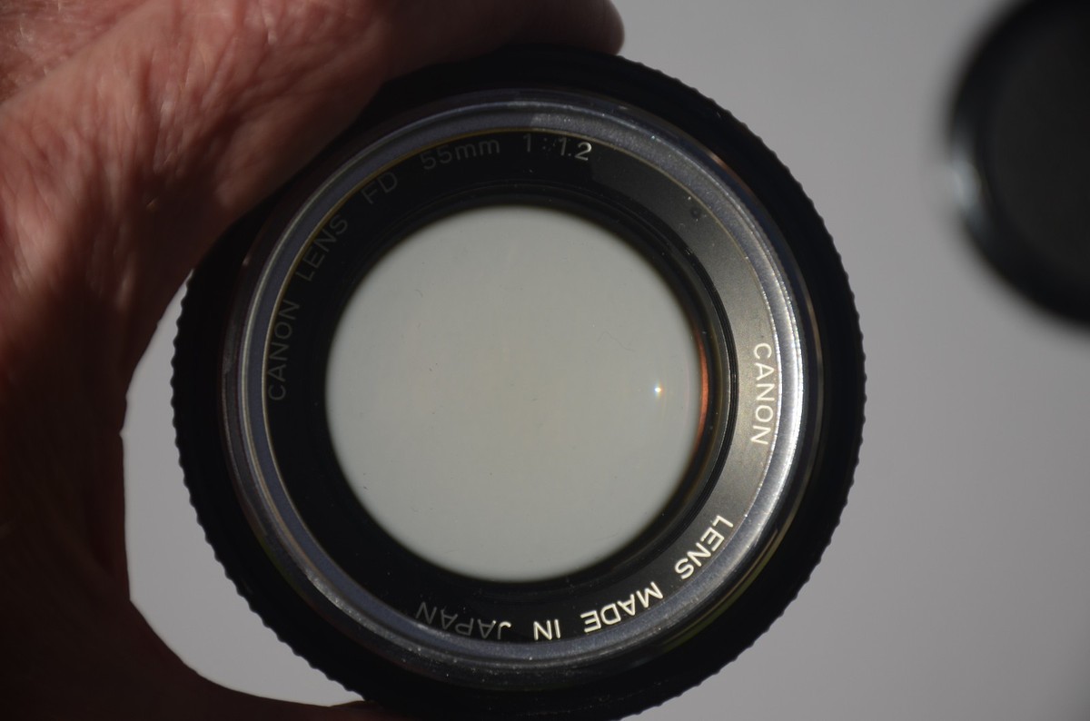 Canon FD 55mm f/1.2 silver nose lens with 