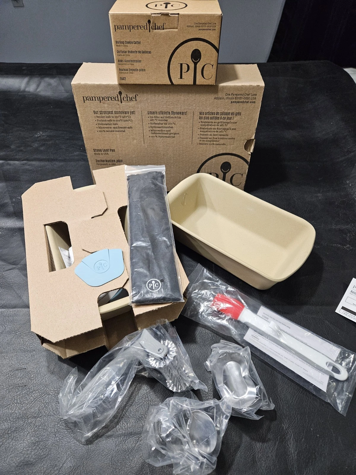 Pampered Chef Lot- Rolling cookie cutter, Stonware Loaf Pans + Extras
Opens in a new window or tab