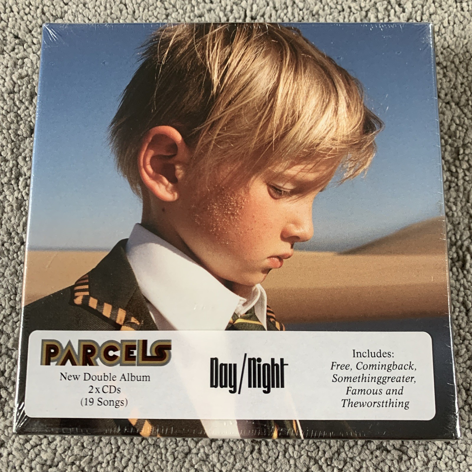 PARCELS -DAY/NIGHT CD BRAND NEW & SEALED