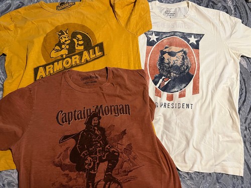 3 UNWORN Lucky Brand SIZE L T-Shirts CAPTAIN MORGAN President ARMOR See Descrip