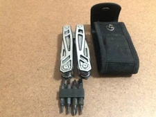 Stainless full size multi tool with sheath and different small tools -Great COND