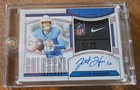 2024 Panini National Treasures Justin Herbert 1/1 Laundry tag NFL shield AUTO