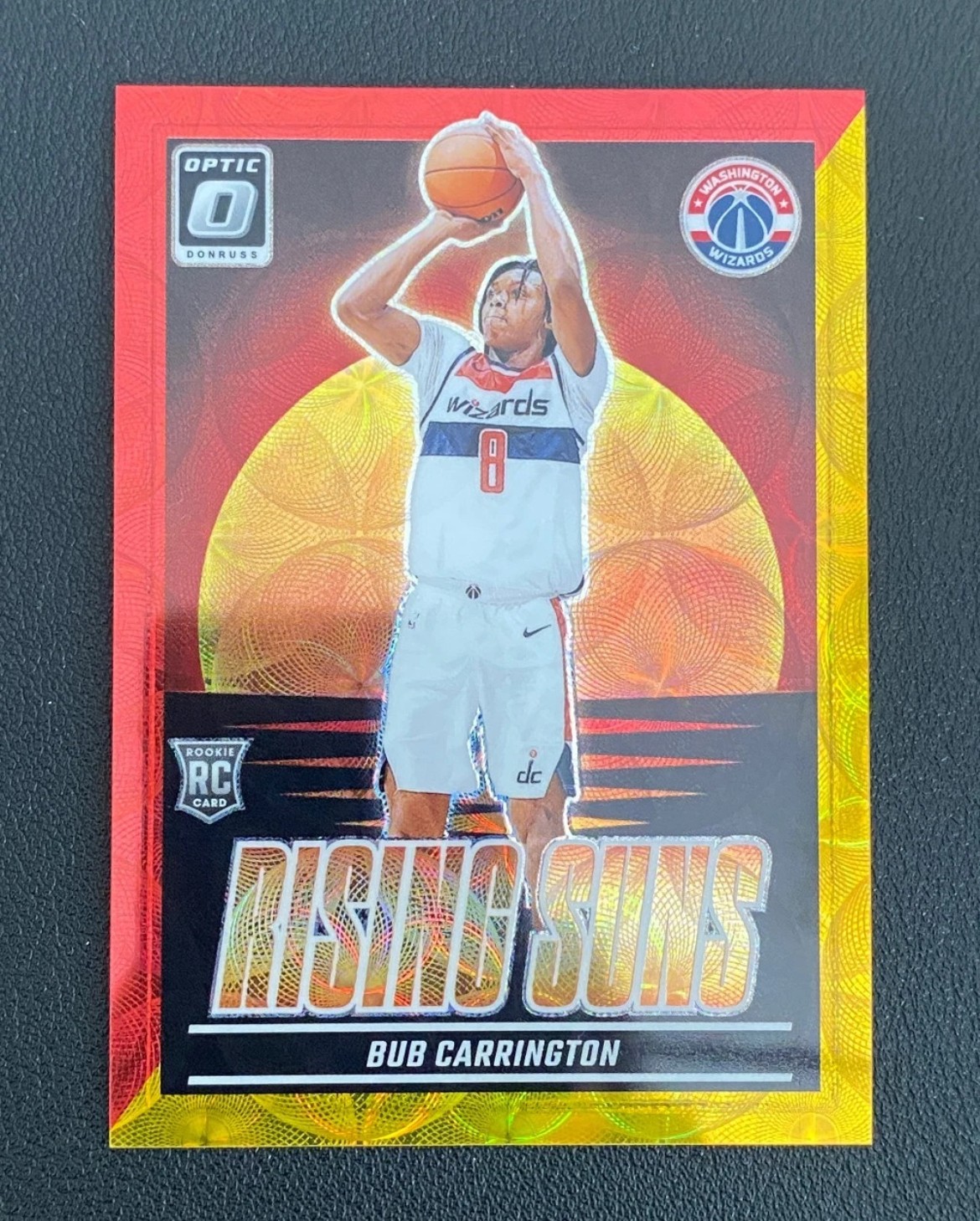 Bub Carrington 2024-25 Panini Donruss Optic Rising Suns Yellow Red /99