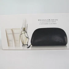 CASHMERE MIST by Donna Karan 4 Pcs Set: 3.4 oz EDP Spray, Cream, Gel & Bag