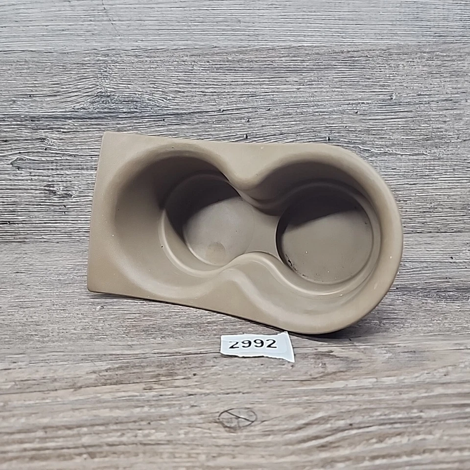 Portavasos consola central delantera 94-97 Chevy S10 GMC JIMMY Sonoma bronceado OEM Foto 2 de 4