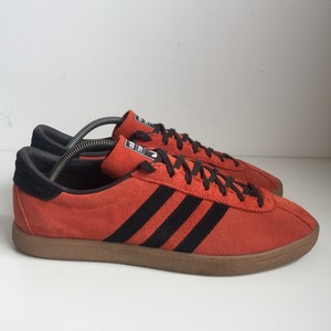 orange adidas trainers