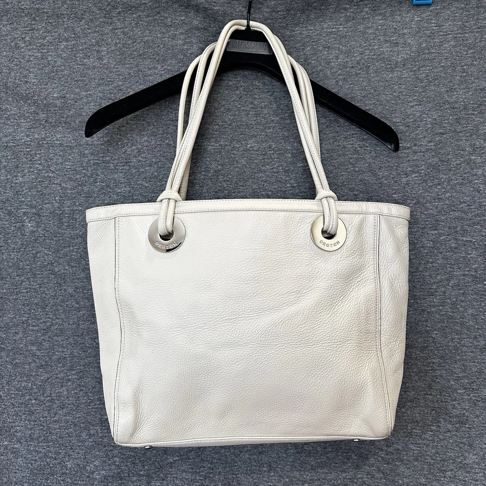 Bolso grande de hombro TOTE de cuero beige oroton plateado con hebillas de orotón en la parte delantera en muy buena condición Foto 3 de 4