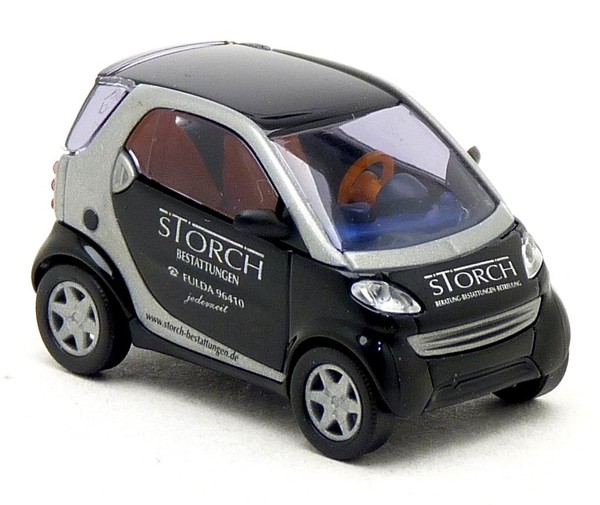 Busch 48950 - Smart Fortwo Coupe C450 Storch Bestattungen Fulda Pkw - 1:87 H0-image