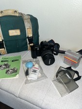 Canon EOS Rebel X S 35mm SLR Film Camera with 28-80 mm Lens PLUS Bag accessories