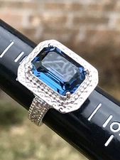 SAI Krishna Zales London Blue Topaz Emerald Cut Stone Scroll Sterling Ring