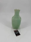 Vintage pale green embossed milk glass floral and bird bud vase.