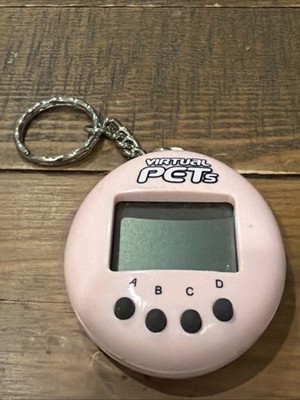 Not Working Vintage 1990s/Y2K Virtual Pets Keychain Toy Pink Electronic