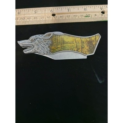 5'' silver wolf head knife with wood scenes on both sides