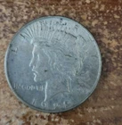 1922 d circulated silver Peace dollar