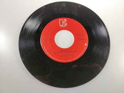 MEL TILLIS RAIN ON MY PARADE/YOUR BODY IS AN OUTLAW ELEKTRA VINYL 45 