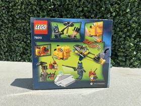 Lego DC Comic Super Heroes- Batman The Penguin Face off (76010)- New- Ships Fast