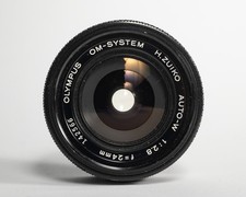 Objectif Olympus OM H.Zuiko Auto-W 24mm F/2.8 – Grand Angle Manuel (n°128774)
