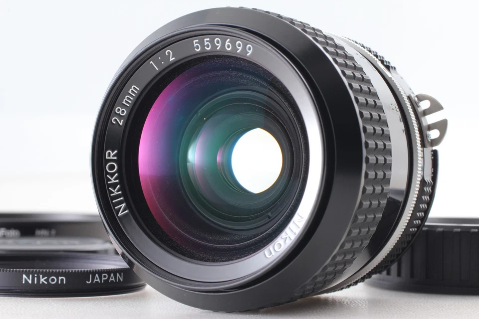 Lente gran angular Nikon Ai Nikkor 28 mm f/2 con capucha HN-1 [Casi como nueva] de JAPÓN Foto 3 de 4