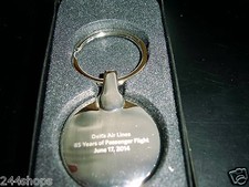 DELTA AIR LINES - KEY CHAIN - 85 YEARS OF PASSENGER SERVICE JUNE 17 2014