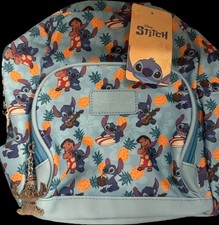 Disney Stitch mini backpack features a tropical print and metallic Stitch charms