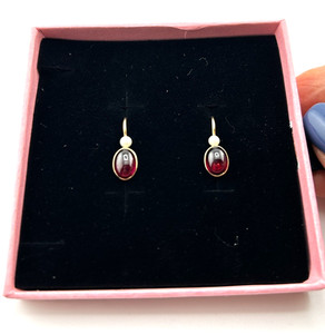 14K Yellow Gold Drop Earrings with Oval Cabochon Cut Garnets and Pearl accents.