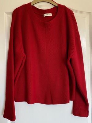 red slouchy jumper