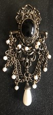 vtg chandelier broch Antiqued beaded 3 inch long