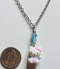 hello kitty charm necklace jewelry sitting 2008 Sanrio.